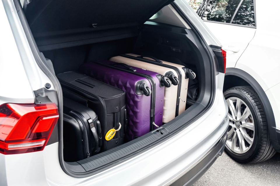 Car trunk packed full of luggage